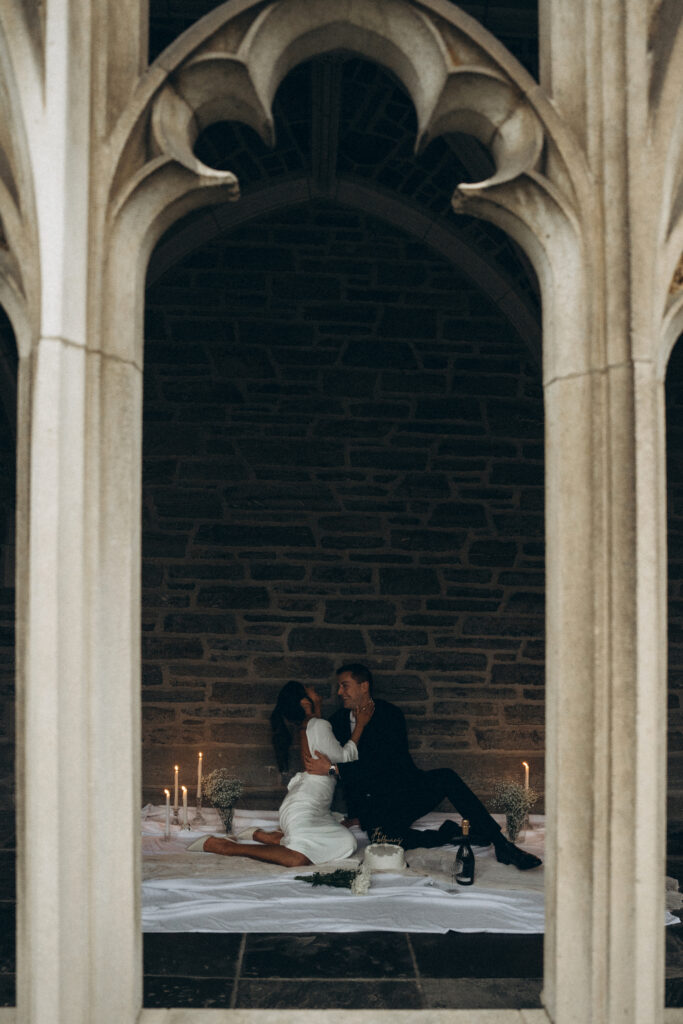 husband making the wife laugh through the architectural window