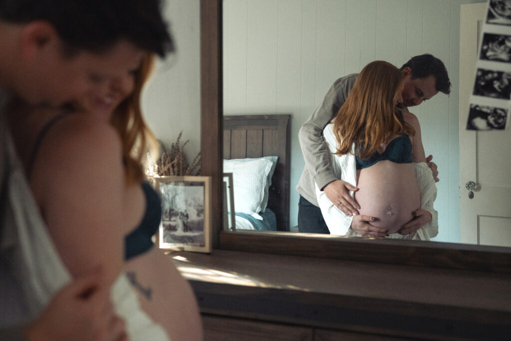 husband and wife in the mirror together