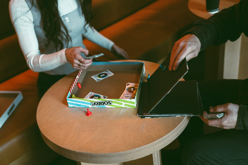 the couple playing a game of Sorry!