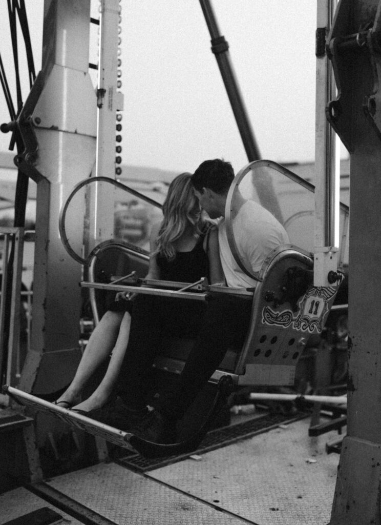 couple riding the Ferris wheel together