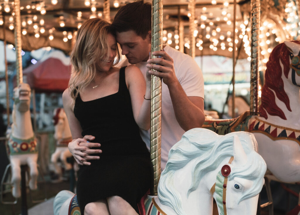 couple on carousel together